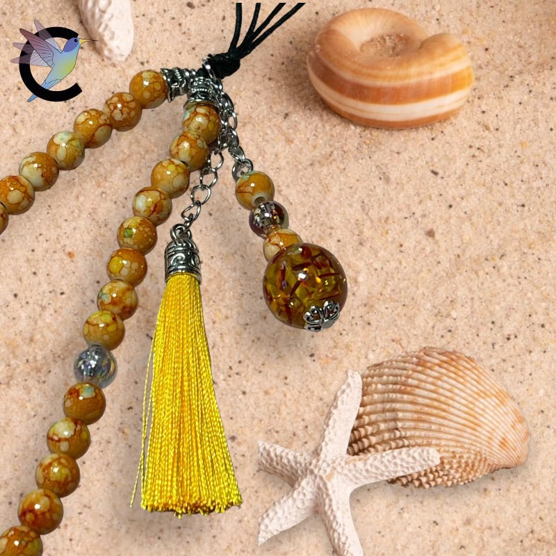 Sable d'Or - Bijou de Téléphone - Perles en Acrylique et Pompon Jaune